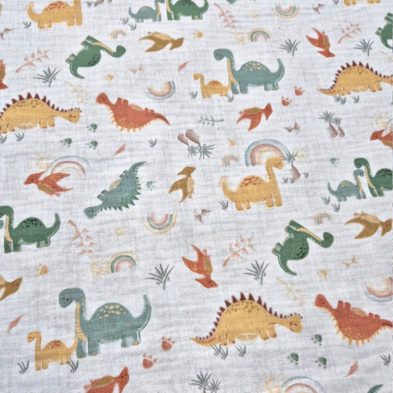 Gaze dupla de algodão por metros.Estampado com dinossauros.