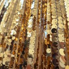 tecido de lantejoulas metálicas | ouro